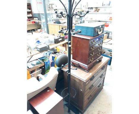 A metal hat and coat stand. 