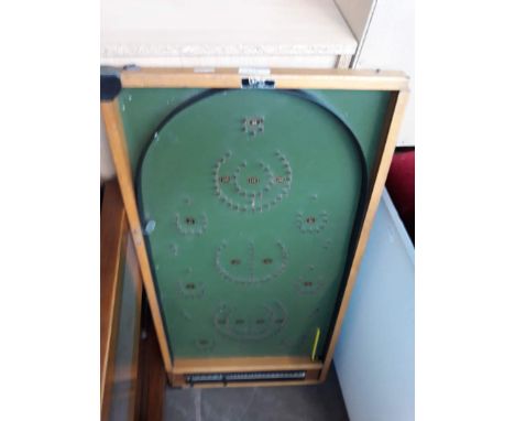 Old bagatelle game. 