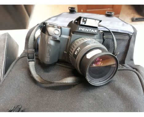 A Pentax camera and bag 