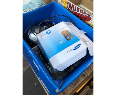 A box containing a house phone, glassware and metalware 