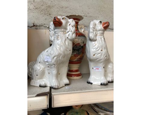 A pair of 19th century Staffordshire pot dogs and an Imari vase 