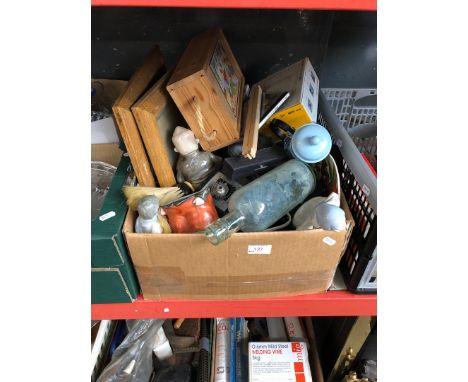 A box of bric a brac including figurines, camera related items, etc 