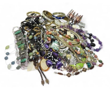 A large collection of costume jewellery to include a gold plated bamboo pattern bangle, gold plated Ladies Waltham watch, a g