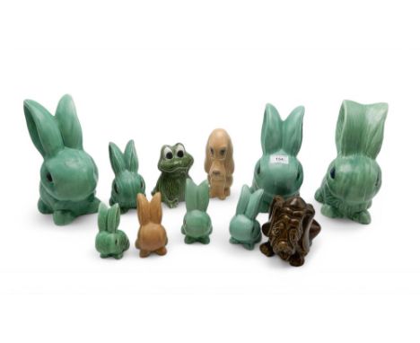 A collection of Sylvac green glazed rabbits including three large models 1027 &amp; 1028, various smaller examples, a frog an