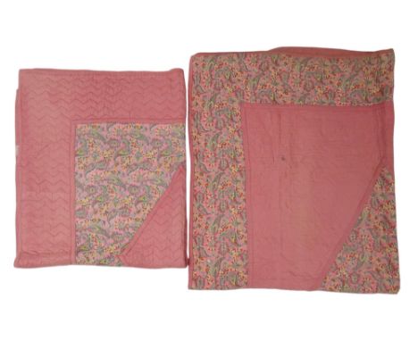 Two similar 1930s/40s Comfy quilts with central pink paisley diamond with dusky pink surround &amp; paisley border, 212cm x 1