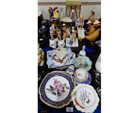 A Beswick boy on horse, Hummel figures including Stormy Weather, Villeroy and Boch pig cruets, Rabbit and egg box, assorted p