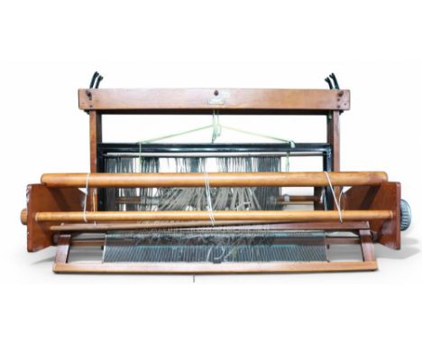 A Weavemaster table top loom and a spinning wheel Condition Report:We would recommend you view these items personally for con