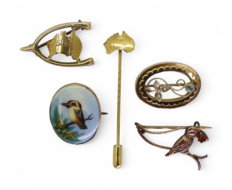 A collection of Australian 9ct gold jewellery to include;- two Kookaburra brooches, one with a porcelain plaque, two made by 