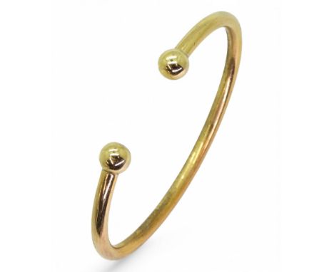 A 9ct gold torc style bangle, weight 19.4gms Condition Report:Available upon request