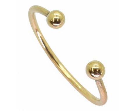 A gents yellow metal torc style bangle, inner diameter approx 7cm, weight 51.5gms Condition Report:Available upon request