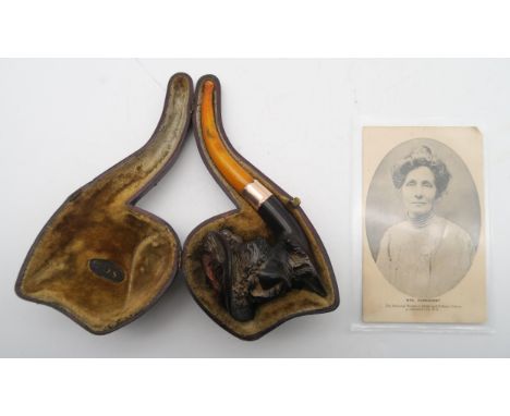 A leather-cased 9ct gold-collared amber-handled Meerschaum pipe, with bowl modelled as an Edwardian lady (possibly Suffragett