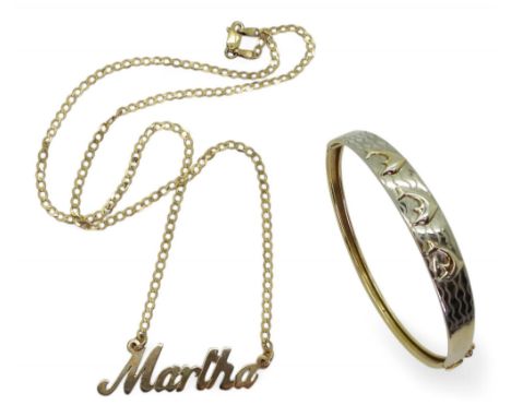 A 9ct yellow and white gold dolphin bangle, together with a 9ct gold Martha pendant necklace, weight together 12.6gms Conditi