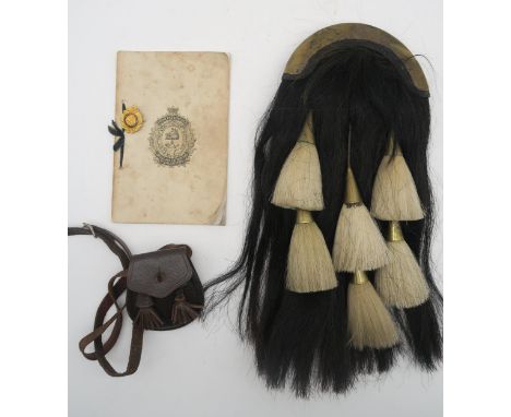 An early-20th century Argyll &amp; Sutherland Highlanders horsehair sporran, black, suspending six white tassels, together wi