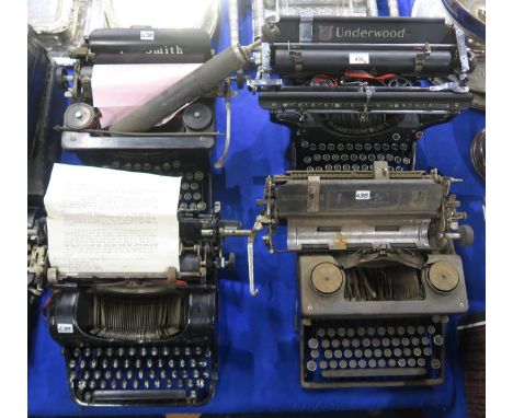 Four vintage typewriters, comprising Underwood, Imperial, L.C. Smith &amp; Corona and Olympia models (4) Condition Report:Ava