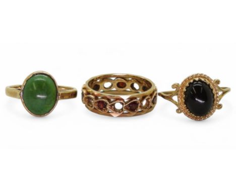 Three 9ct gem set rings, turquoise size N1/2, mood stone size R, and a garnet and pearl eternity ring, size n, weight combine