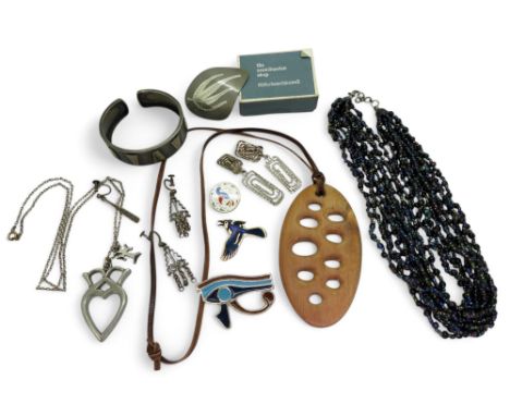 A lot of retro jewellery to include a white metal bangle with continental hallmarks, a steel brooch sold by the Scandinavian 