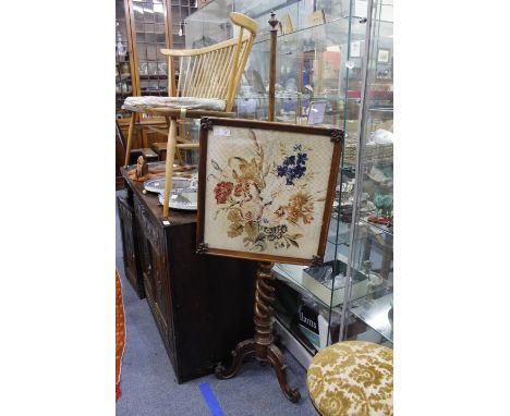 A VICTORIAN MAHOGANY AND TAPESTRY FIRE SCREEN with a carved spiral stem 50cm wide 