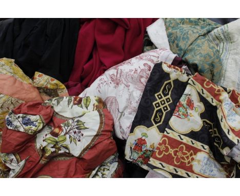 AN OLD FARROW AND JACKSON TIN TRUNK and a collection of fabric, curtains and Oxford legal robes, mortar and cloak