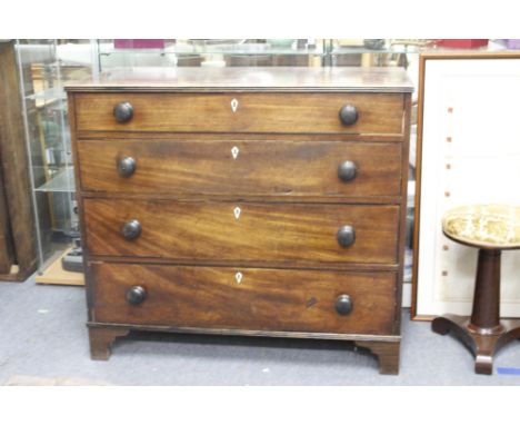 A VICTORIAN MAHOGANY FOUR LONG DRAWER CHEST standing on bracket feet, 108cm wide x 97cm high x 51cm deep