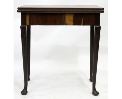 AN EARLY GEORGE III MAHOGANY FOLDOVER CARD TABLE fitted with frieze drawer, standing on pad feet 69cm x 73cm x 38cm 
