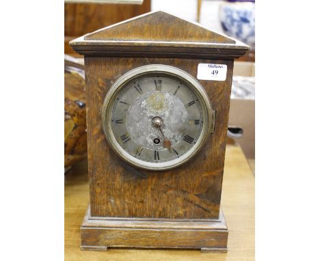 A WORLD WAR II RAF MANTLE CLOCK in case, with engraved dial and dated to the movement 1939 35cm high 