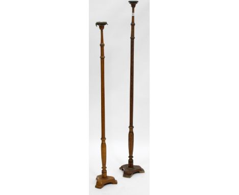 TWO OAK HAT STANDS of fluted column form, the largest 136cm in height