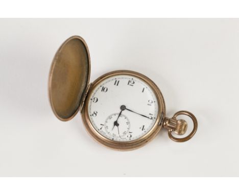 "CRITERION" EARLY 20TH CENTURY GILT METAL CASED HUNTER POCKET WATCH having self wind 15 jewel movement, Arabic white enamel d