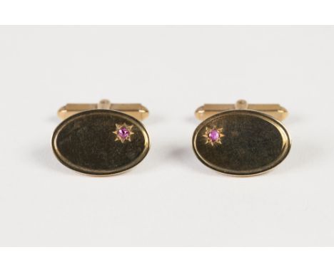 PAIR OF 9ct GOLD 'T' BAR CUFF LINKS, the plain oval tops each set with a tiny ruby, 9.2gms  