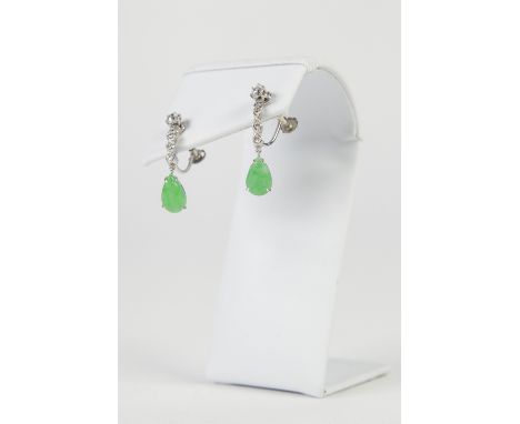 A PAIR OF 18ct  WHITE GOLD, DIAMOND AND GREEN JADE EARRINGS, each having a small diamond over a string of three tiny diamonds