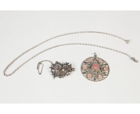 LATE 19th/EARLY 20th CENTURY WHITE METAL, PROBABLY INDIAN, OPENWORK BROOCH formed of an exotic bird perched amongst leafage s