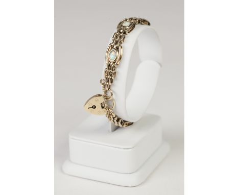9ct GOLD GATE LINK BRACELET, SET WITH SEVEN OPALS, and having padlock clasp, 17.5gms 