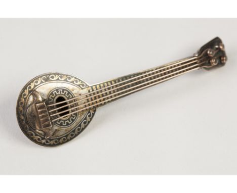 NINETEENTH CENTURY RUSSIAN NIELLO WORK LONG NECK LUTE BROOCH, with gold coloured metal strings, 3 1/4" long 