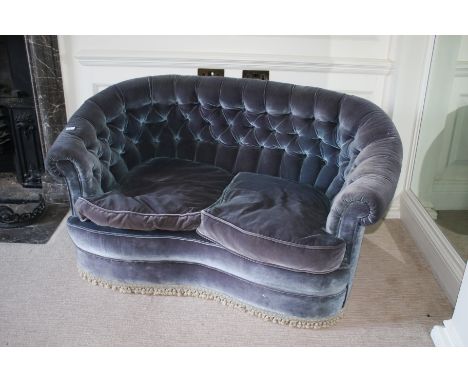 A Victorian style scroll and button backed shaped two seat sofa, 80cm H, 137cm W, 60cm D, in teal velvet covering 