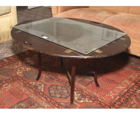 A contemporary butler table. Brass hinges to the folding sides with plate glass to middle and an associated splayed leg stand