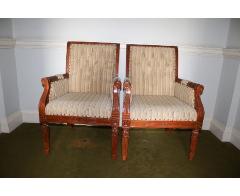 A pair of 20th century mahogany armchairs, 102cm H 69cm W 63cm, with button back upholstered seat, reeded decoration 