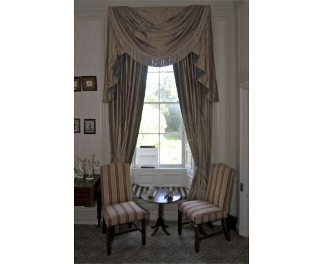 A pair of damask silk lined curtains and matching tasselled pelmet. The fabric decorated with a turquoise and brown print, cr
