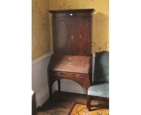 A late 18th century Georgian oak bureau bookcase. 195cm H, 84cm W, 50cm D, with fine inlay together with a pewter capstan ink
