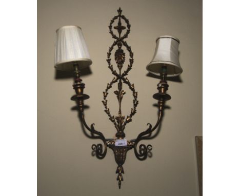 A 20th century Georgian style hare brass two branch wall light.