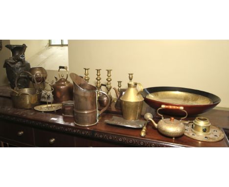 A large collection of metalware including jugs, teapots, kettles, inkwell, candlesticks etc 