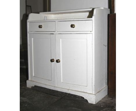 Late 19th century painted pine cabinet. With two drawers and cupboard and open shelf containing a quantity of sliver plate cu