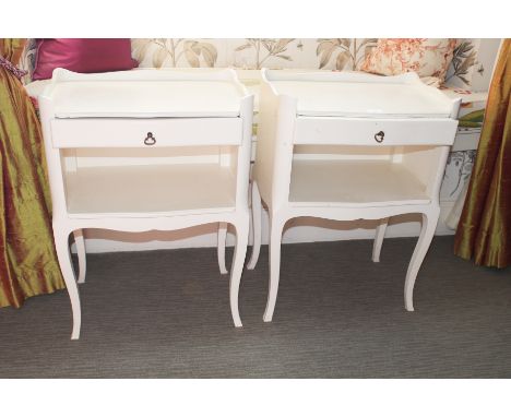 A pair of French painted bedside cabinets, 69cm H, 49cm W, 34cm D, with frieze drawers and open shelf 