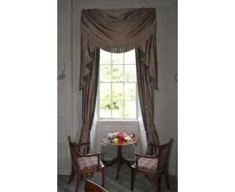 A pair of damask silk lined curtains and matching tasselled pelmet. The fabric decorated with a turquoise and brown print, cr