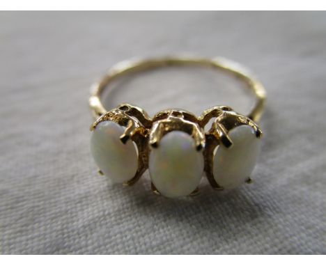 Gold 3 stone opal ring