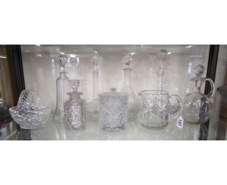 Shelf of decanters etc