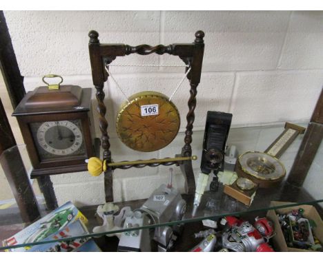 Shelf of collectables to include gong & clock