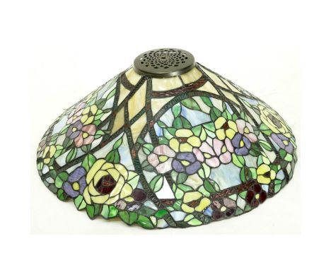 Vintage leaded glass lamp shade. Unsigned. Measures 22-3/4" W x 12" H. Condition: Good condition. Estimate: $100.00 - $200.00