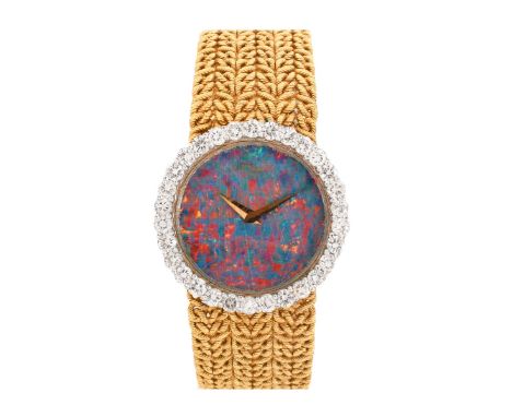 Lady's Vintage Chopard 18 Karat Yellow Gold Bracelet watch with Round Brilliant Cut Diamond Bezel and Black Opal Dial, Manual