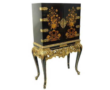 Early to Mid 20th Century English Black Lacquered Gilt Painted Marquetry Inlaid Cabinet on Stand. Two fitted door with interi