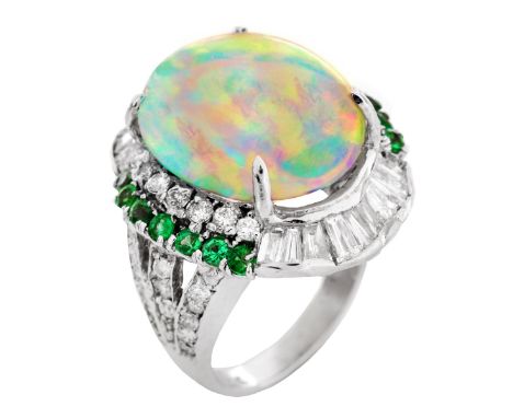 Vintage Oval Cabochon Opal, Round Brilliant and Baguette Cut Diamond, Round Cut Emerald and 14 Karat White Gold Ring. Opal me