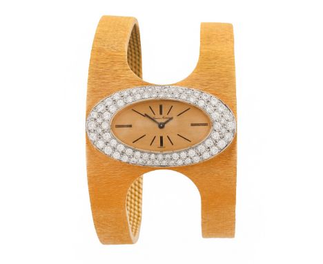 Lady's Retro French Made for Neiman Marcus Heavy 18 Karat Yellow Gold Cuff Bracelet Watch with Diamond Bezel, Manual Movement